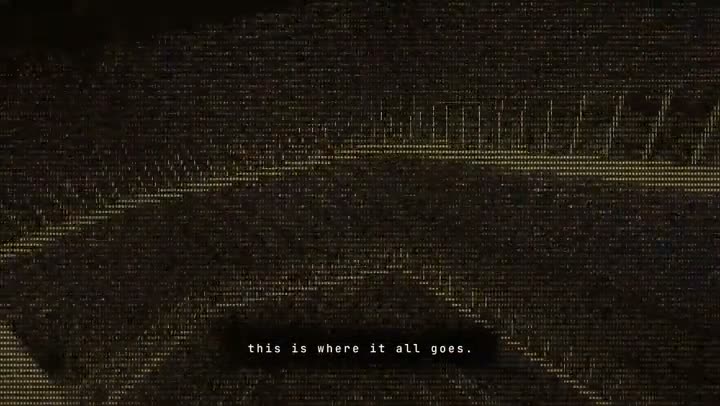 Video frame of golden text art made of characters filling a dark screen, with subtitles