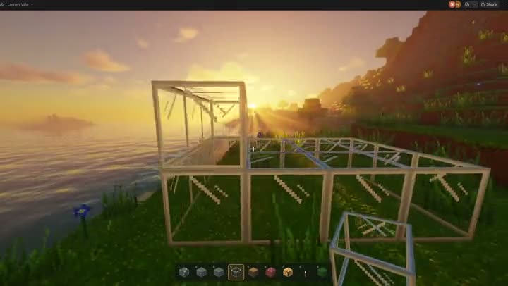 Browser block game with a glass-block structure being built on a beach at sunset